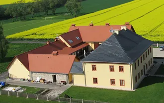 Na rekonstrukci fary byl zvolen Opál